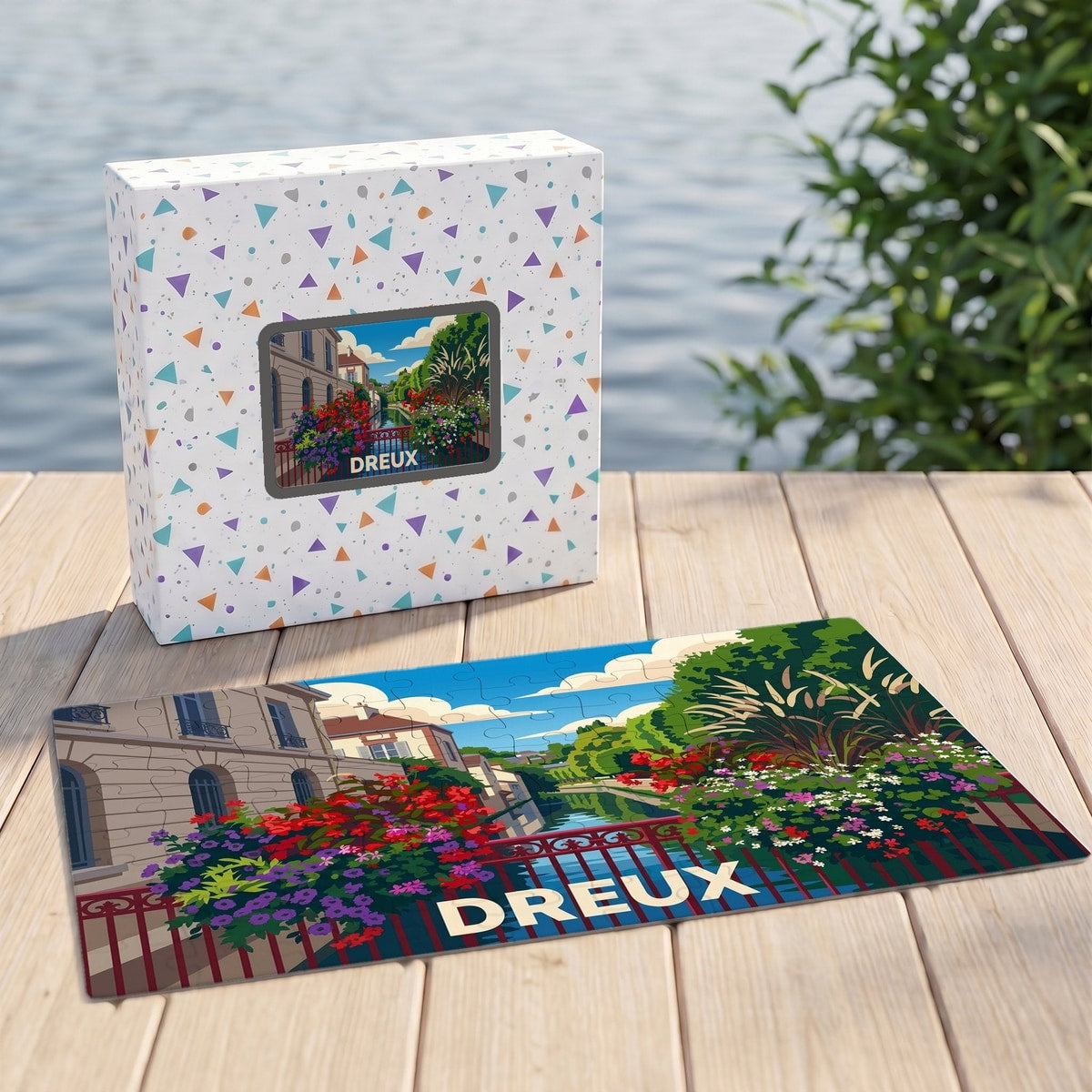 Puzzle souvenir de la ville de Dreux avec une illustration colorée et fleurie de ses canaux.