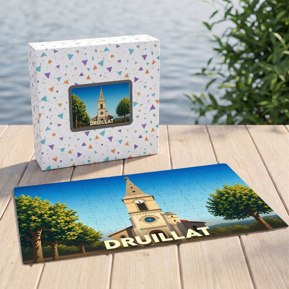 Puzzle souvenir de la ville de Druillat illustrant son église dans un style graphique épuré.