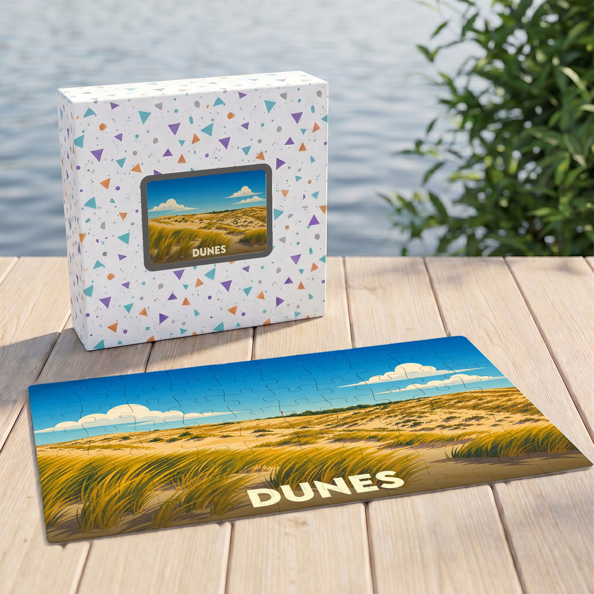 Puzzle souvenir de la ville de Dunes avec une illustration stylisée de paysage dunaire.