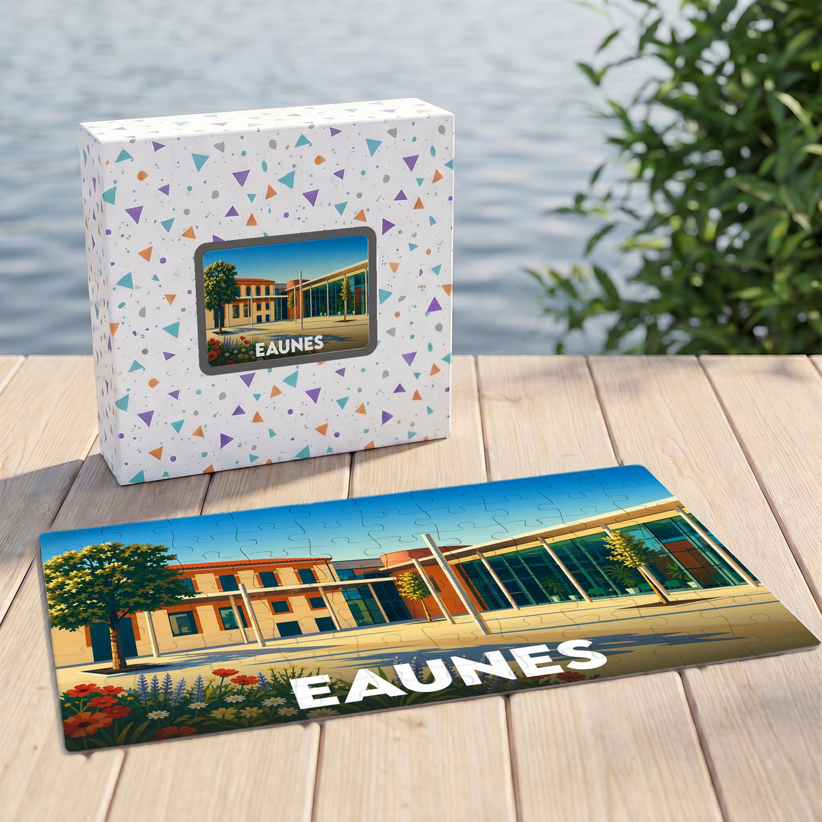 Puzzle souvenir de la ville d'Eaunes avec une illustration stylisée et sa boîte assortie.