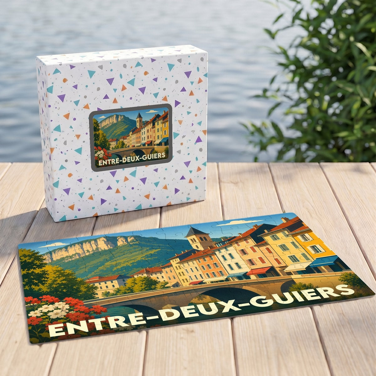 Puzzle souvenir de la ville d'Entre-deux-Guiers avec une illustration stylisée et colorée.