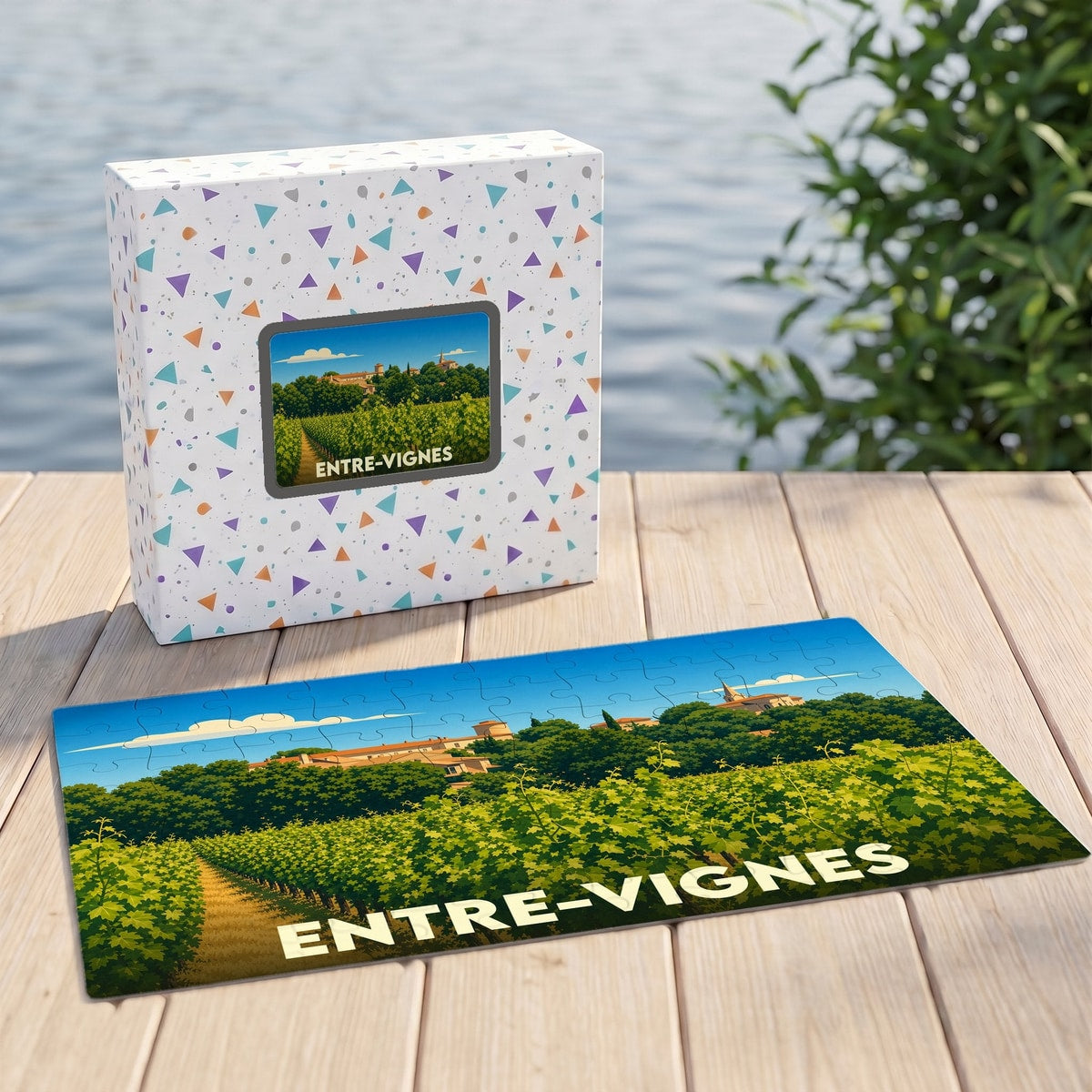 Puzzle souvenir de la ville d'Entre-Vignes représentant un paysage de vignobles avec une illustration stylisée.