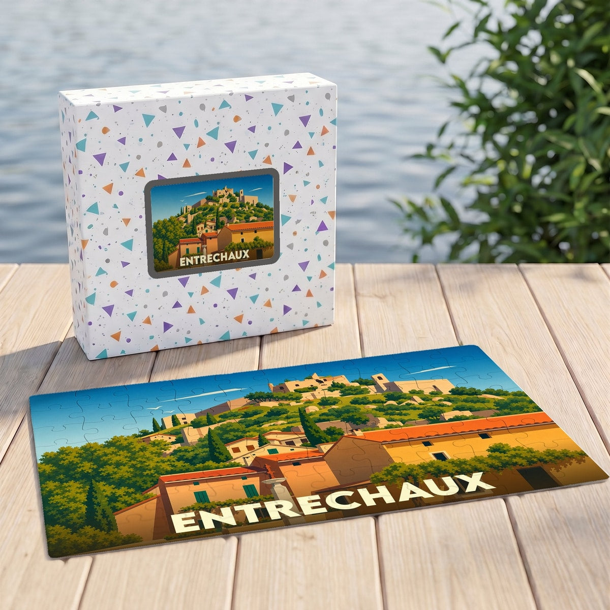 Puzzle souvenir de la ville d'Entrechaux avec une illustration stylisée de son village provençal.