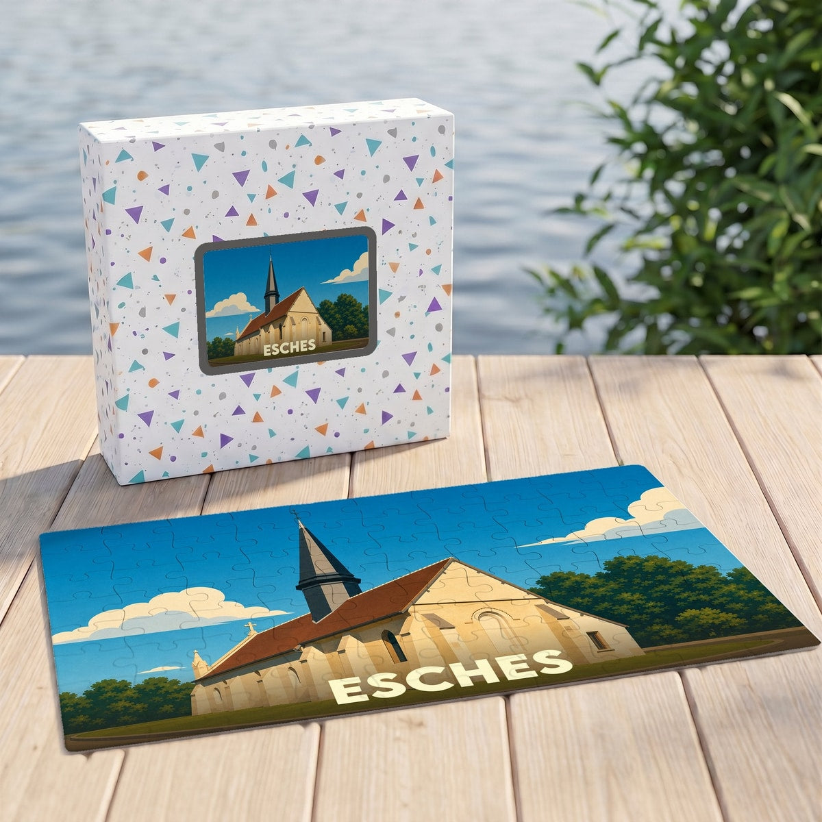 Puzzle souvenir de la ville d'Esches représentant son église dans un style illustré.