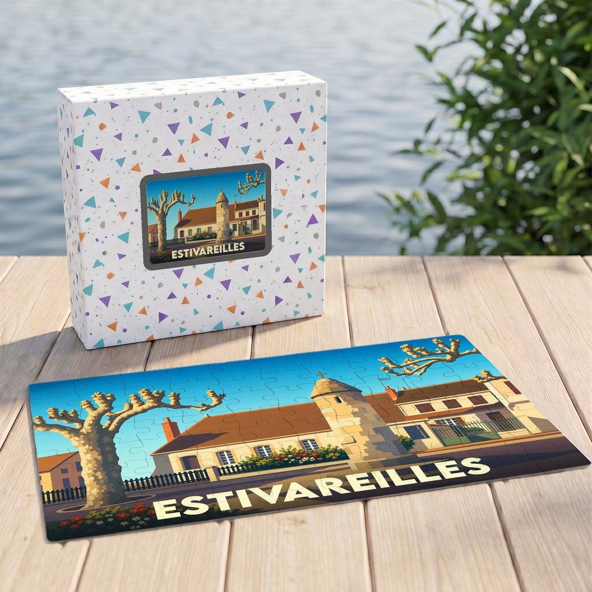 Puzzle souvenir de la ville d'Estivareilles avec une illustration stylisée d'un bâtiment historique et de platanes.