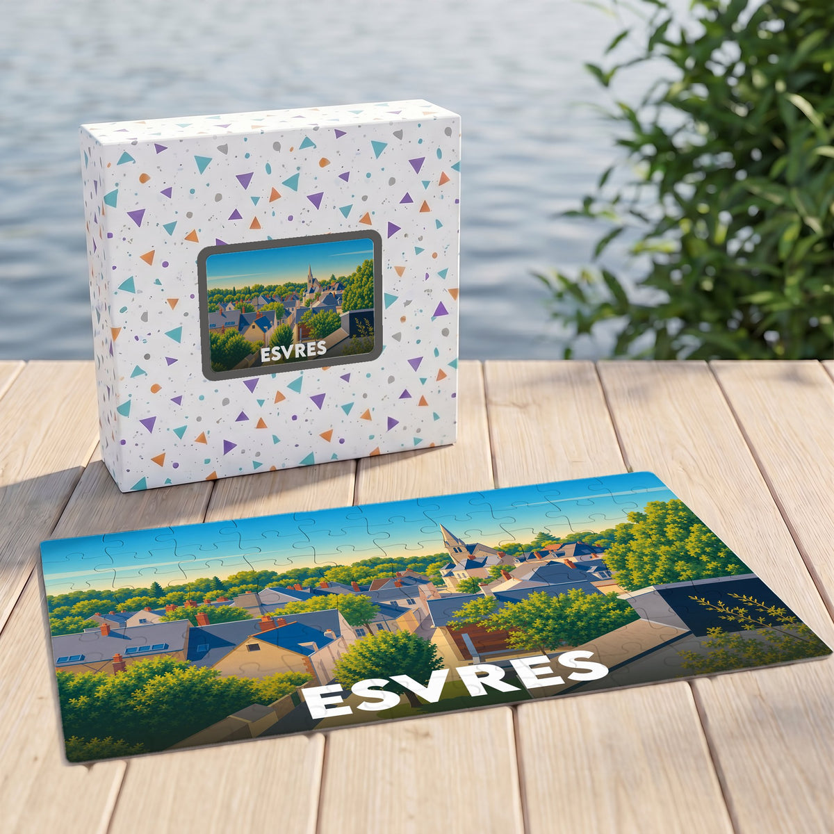 Puzzle souvenir de la ville d'Esvres présentant une illustration stylisée et son coffret assorti.