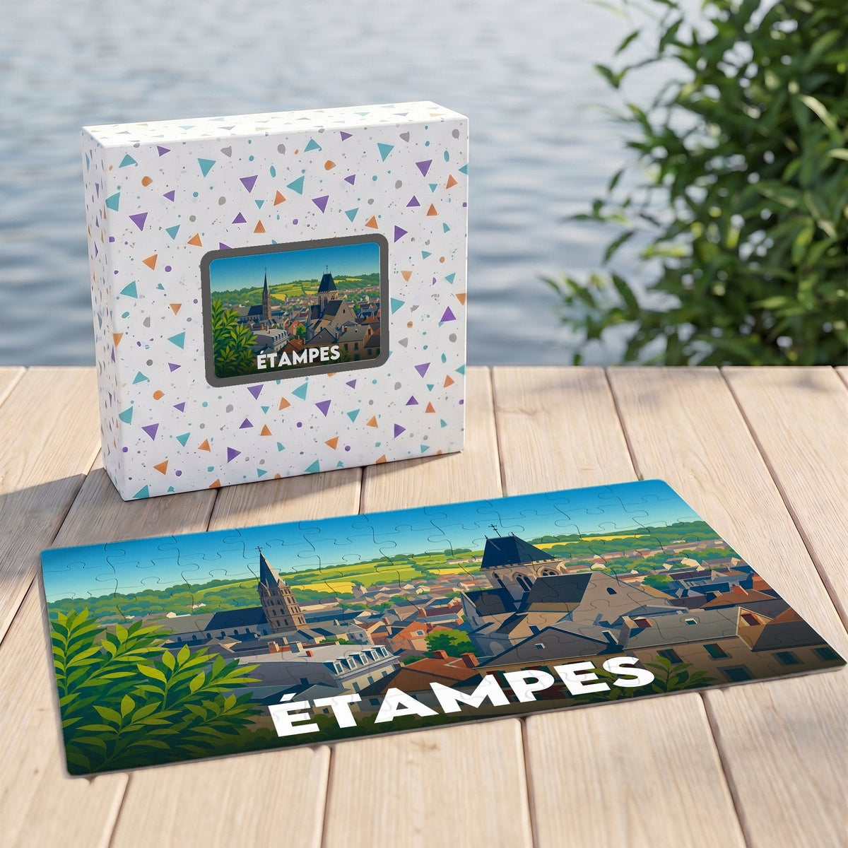Puzzle souvenir de la ville d'Étampes illustré par une vue panoramique stylisée.