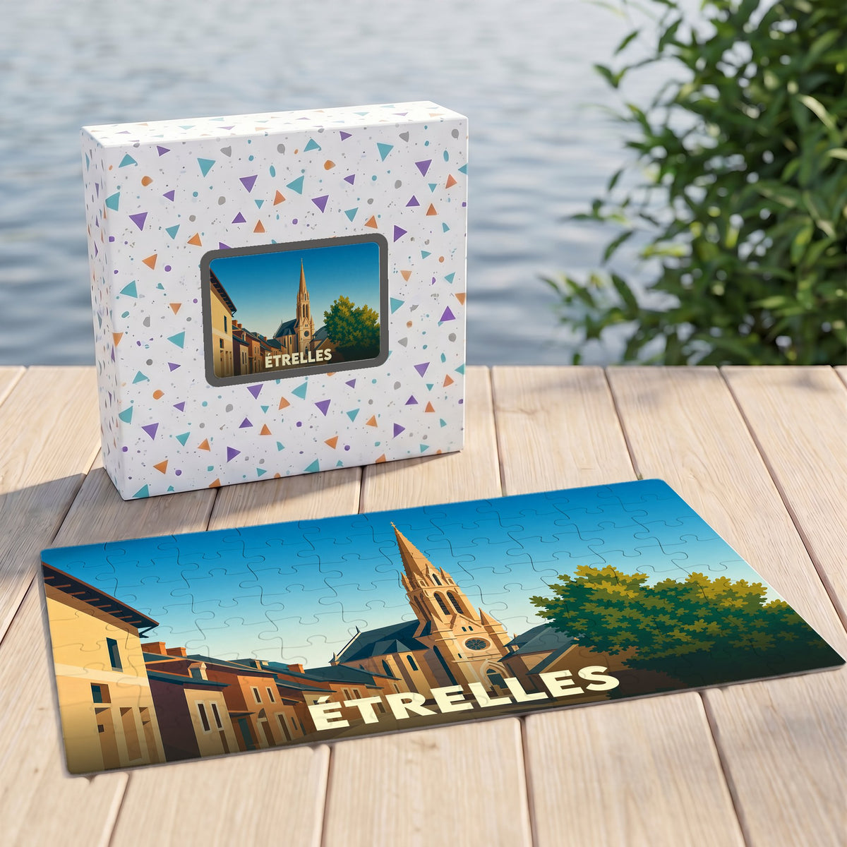 Puzzle souvenir de la ville d'Étrelles avec une illustration stylisée de son église et de ses rues.