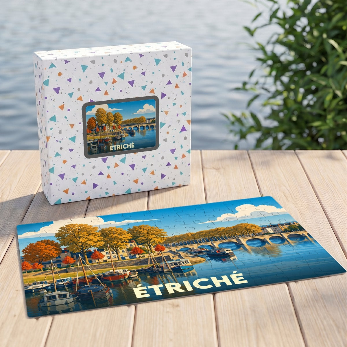 Puzzle souvenir de la ville de Étriché avec une illustration stylisée d'un paysage fluvial.
