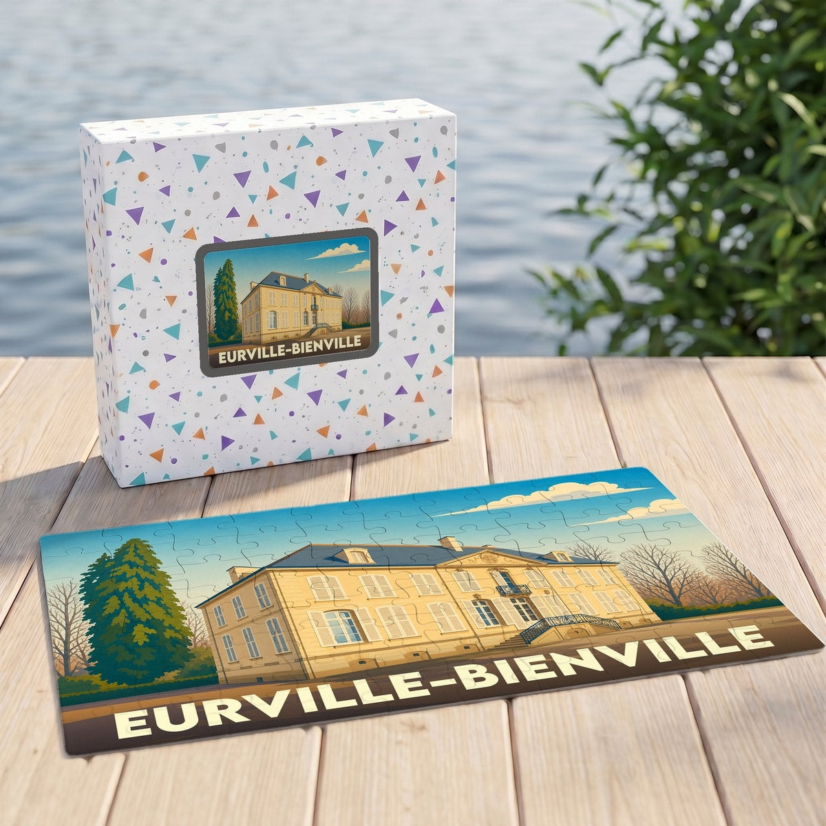 Puzzle souvenir de la ville d'Eurville-Bienville avec une illustration stylisée d'un château sur sa boîte et ses pièces assemblées.