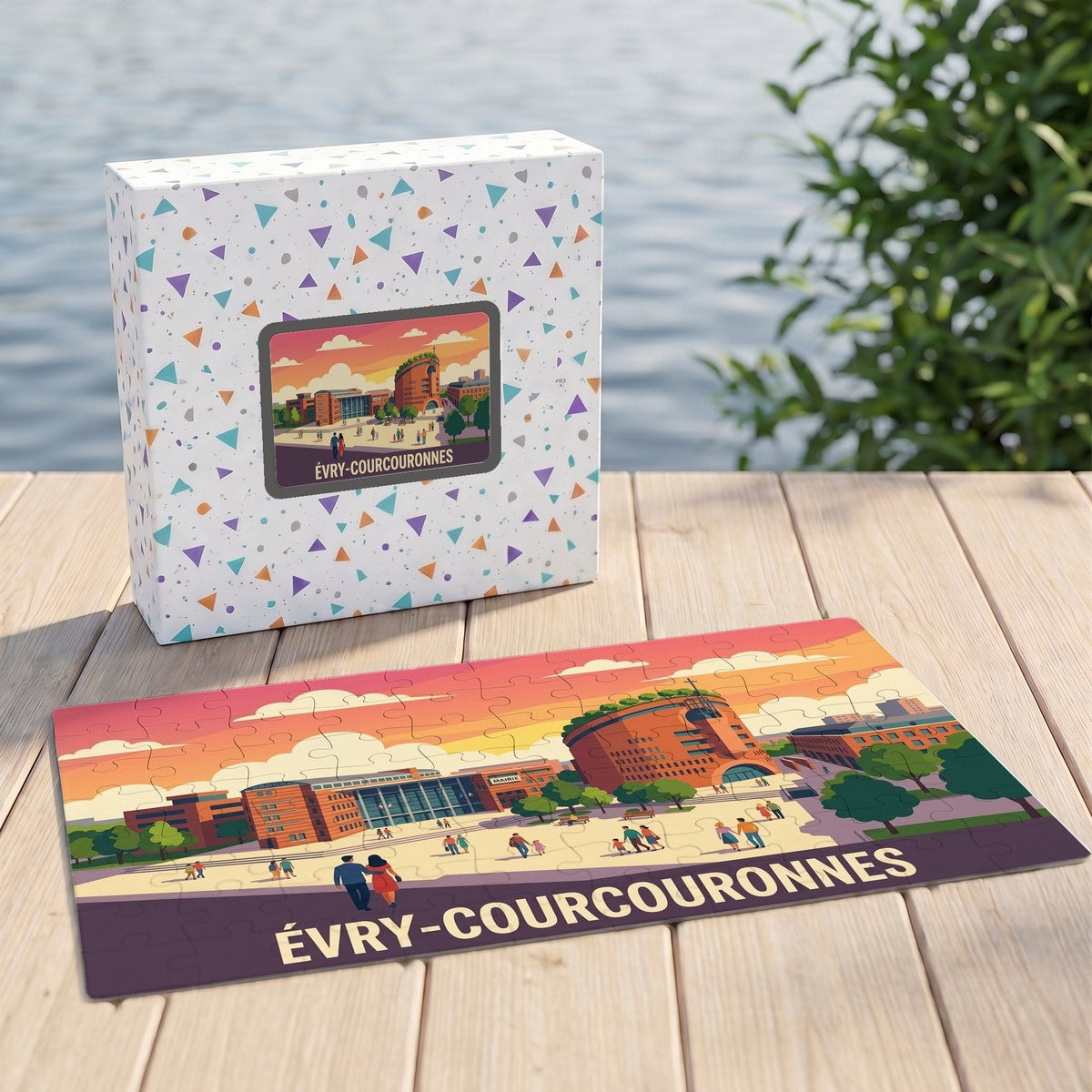 Puzzle souvenir de la ville d'Évry-Courcouronnes avec une illustration stylisée de ses monuments emblématiques au coucher du soleil.