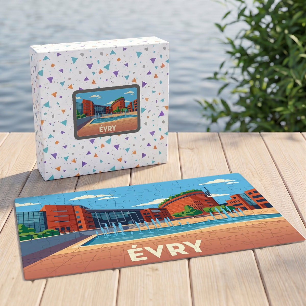 Puzzle souvenir de la ville d'Évry présentant une illustration colorée et stylisée de ses bâtiments emblématiques.