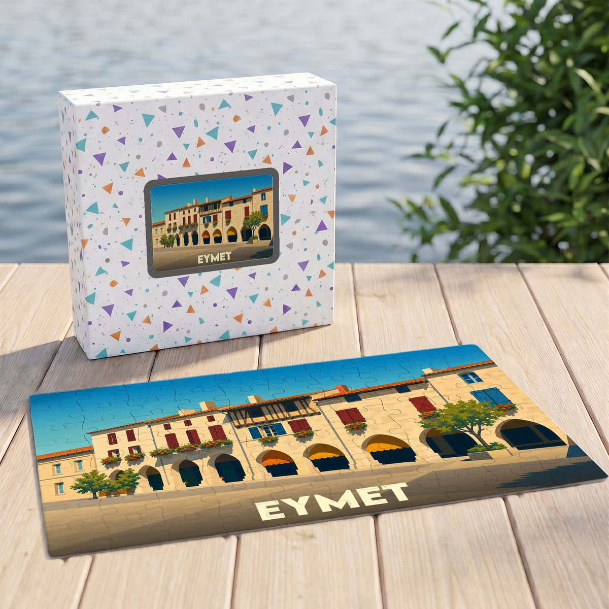 Puzzle souvenir de la ville d'Eymet avec une illustration stylisée de sa place à arcades.