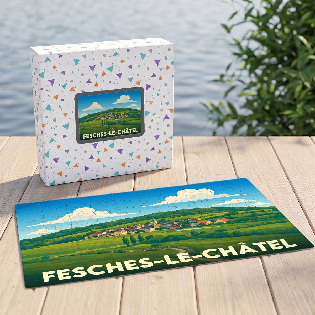Puzzle souvenir de la ville de Fesches-le-Châtel avec une illustration stylisée d'un paysage rural.
