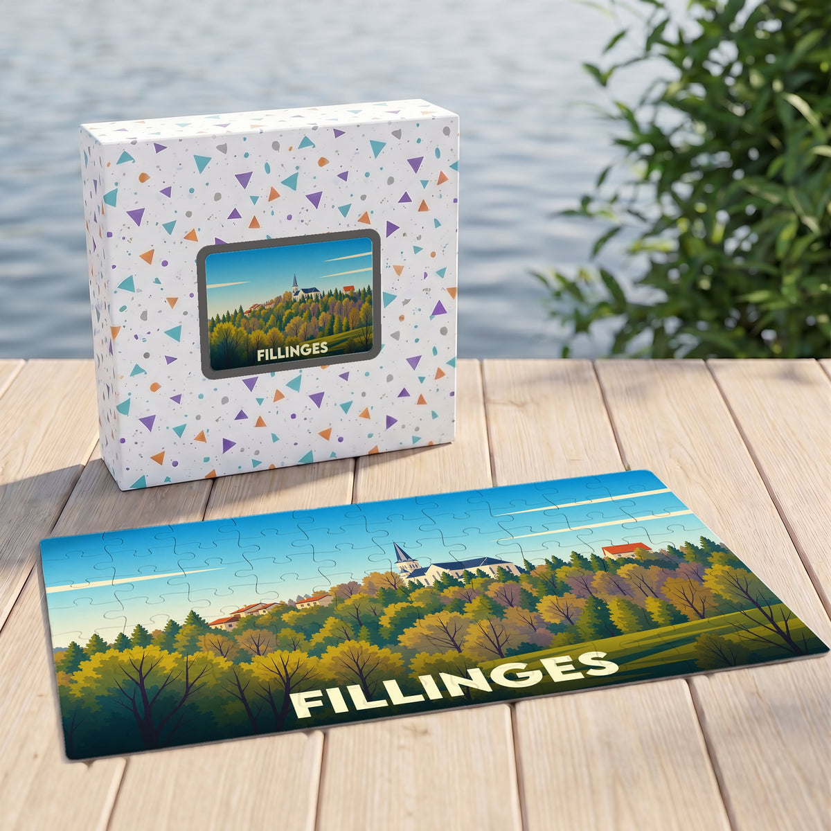 Puzzle souvenir de la ville de Fillinges avec une illustration stylisée de son paysage.