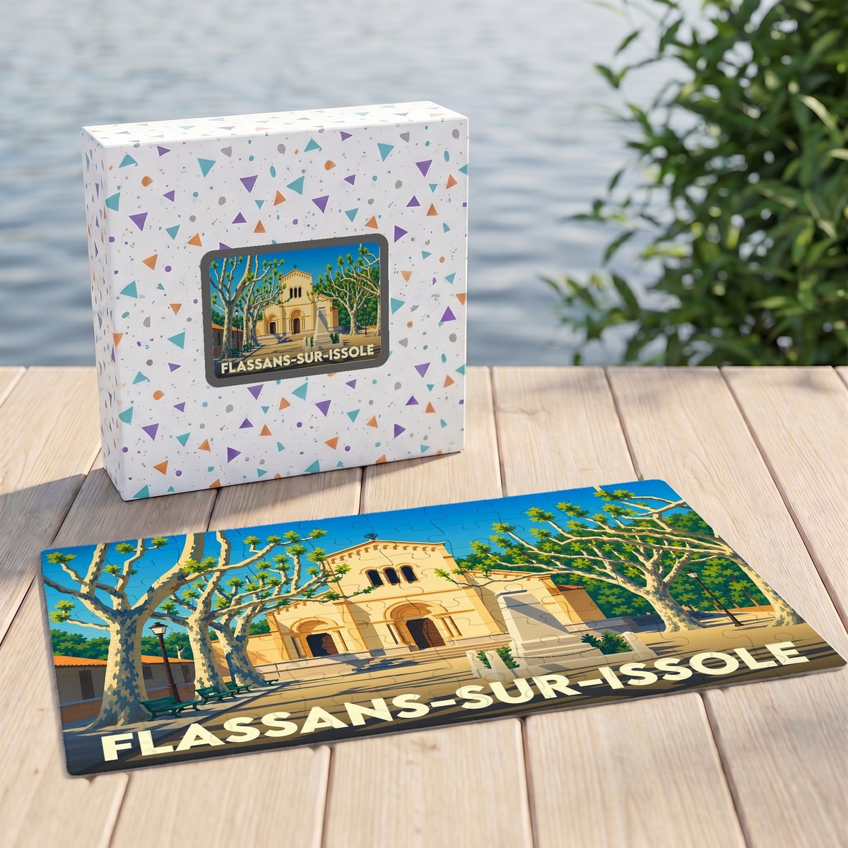 Puzzle souvenir de la ville de Flassans-sur-Issole avec une illustration stylisée de son église et de sa place arborée.