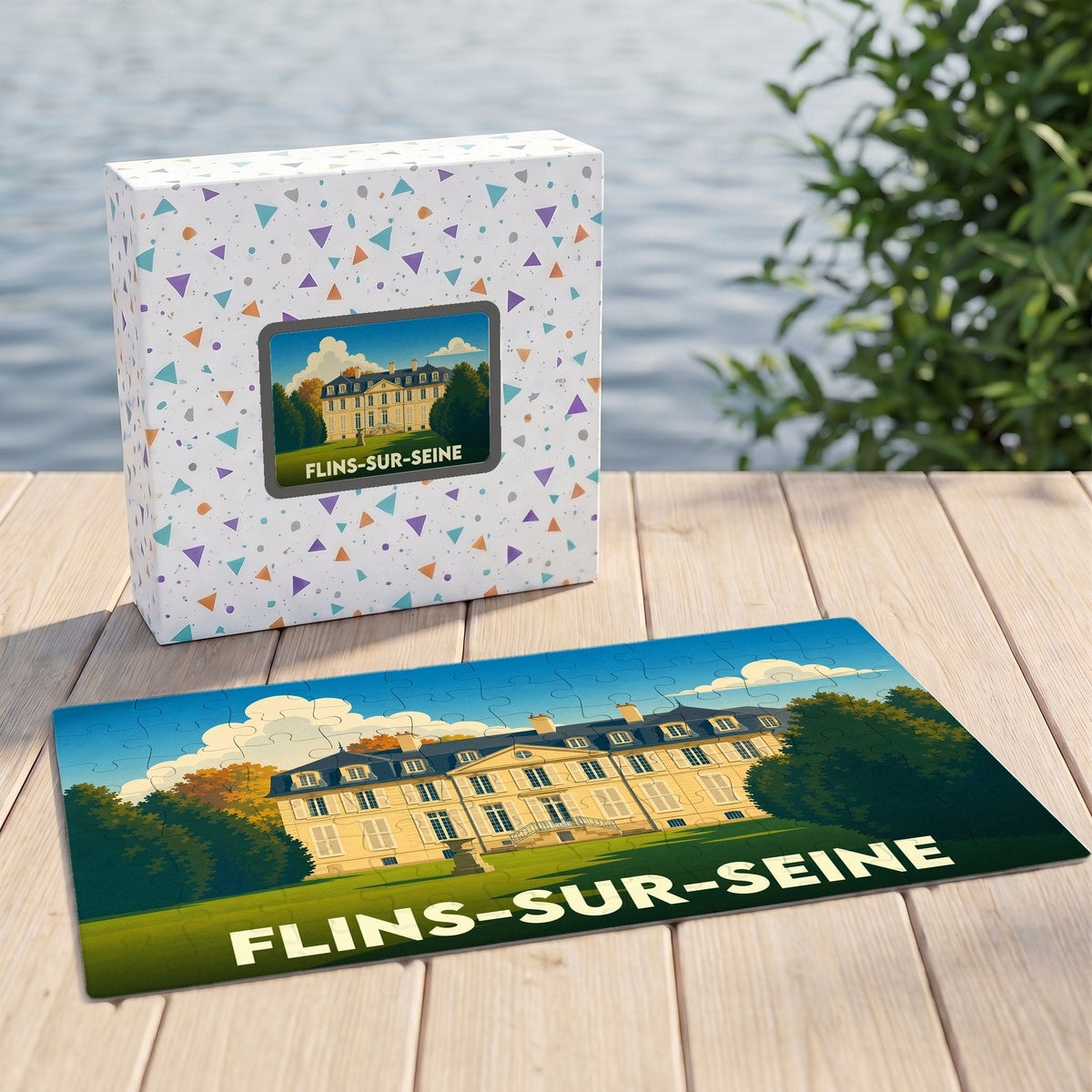 Puzzle souvenir de la ville de Flins-sur-Seine avec son carton d'emballage illustré.