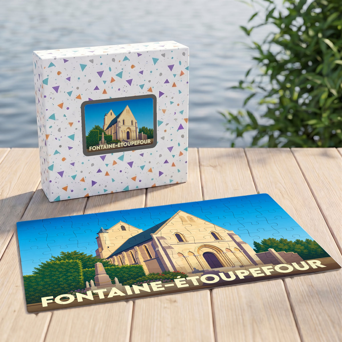 Puzzle souvenir de la ville de Fontaine-Étoupefour avec une illustration stylisée de son église.