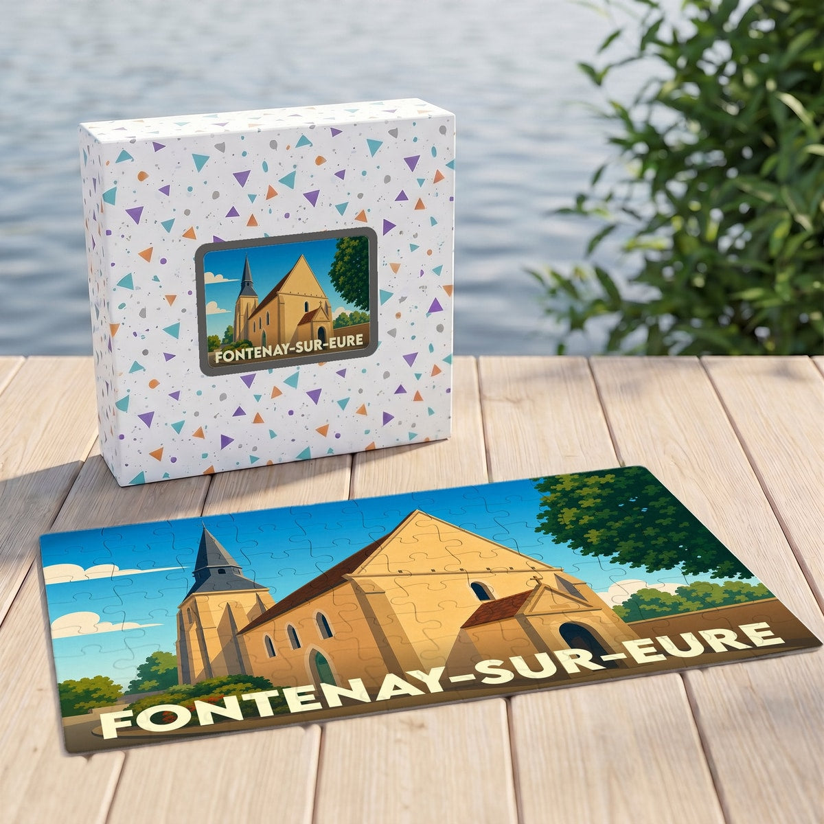 Puzzle souvenir de la ville de Fontenay-sur-Eure avec une illustration stylisée de son église.