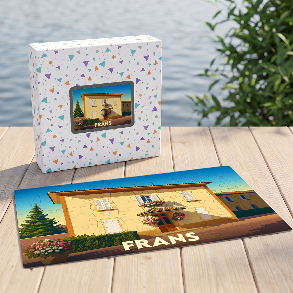Puzzle souvenir de la ville de Frans avec une illustration stylisée d'une maison provençale.