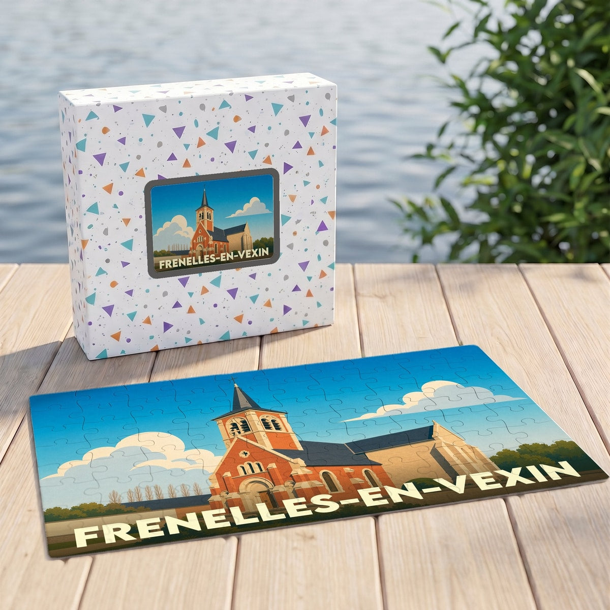 Puzzle souvenir de la ville de Frenelles-en-Vexin illustré par une vue stylisée de son église.