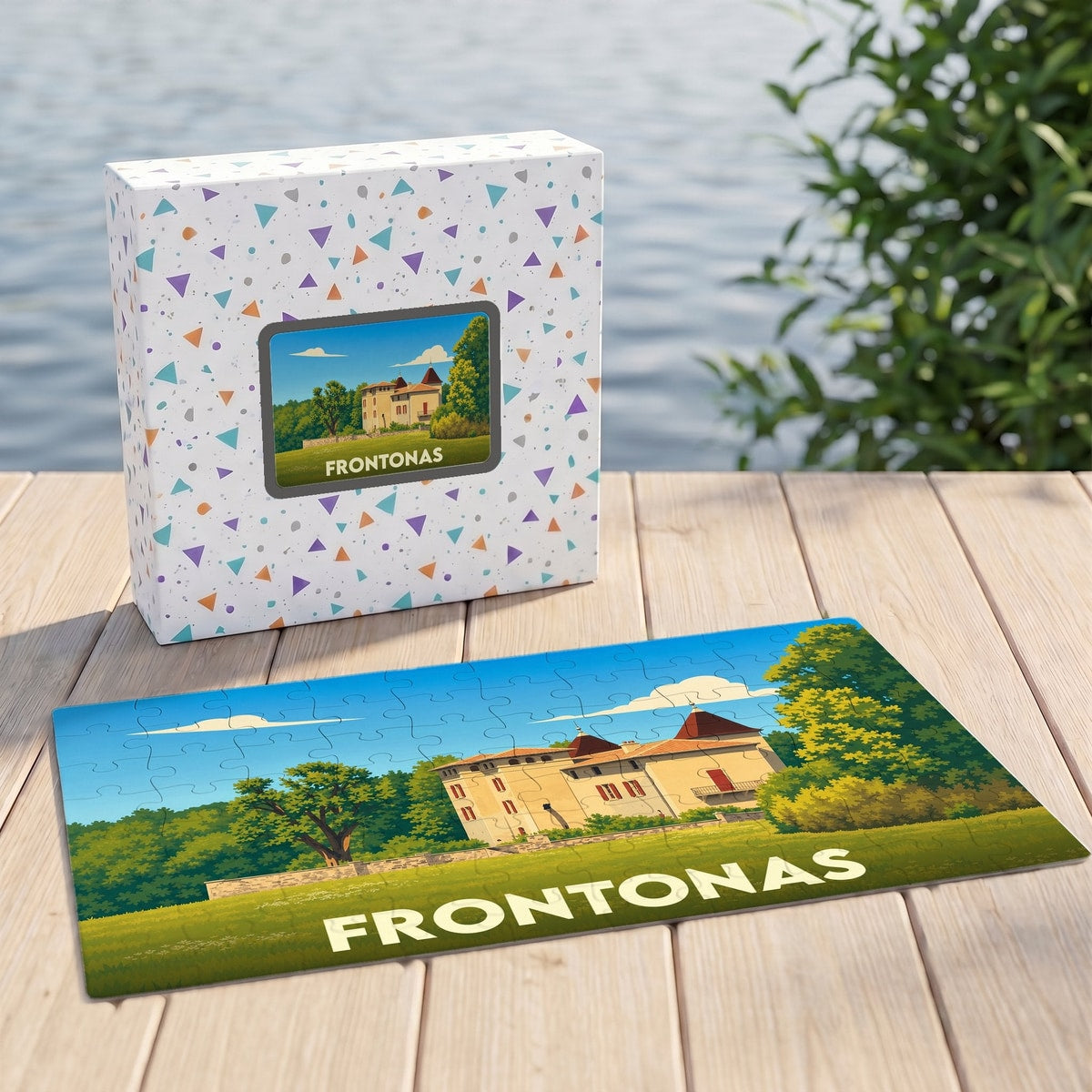 Puzzle souvenir de la ville de Frontonas avec une illustration stylisée d'un château.
