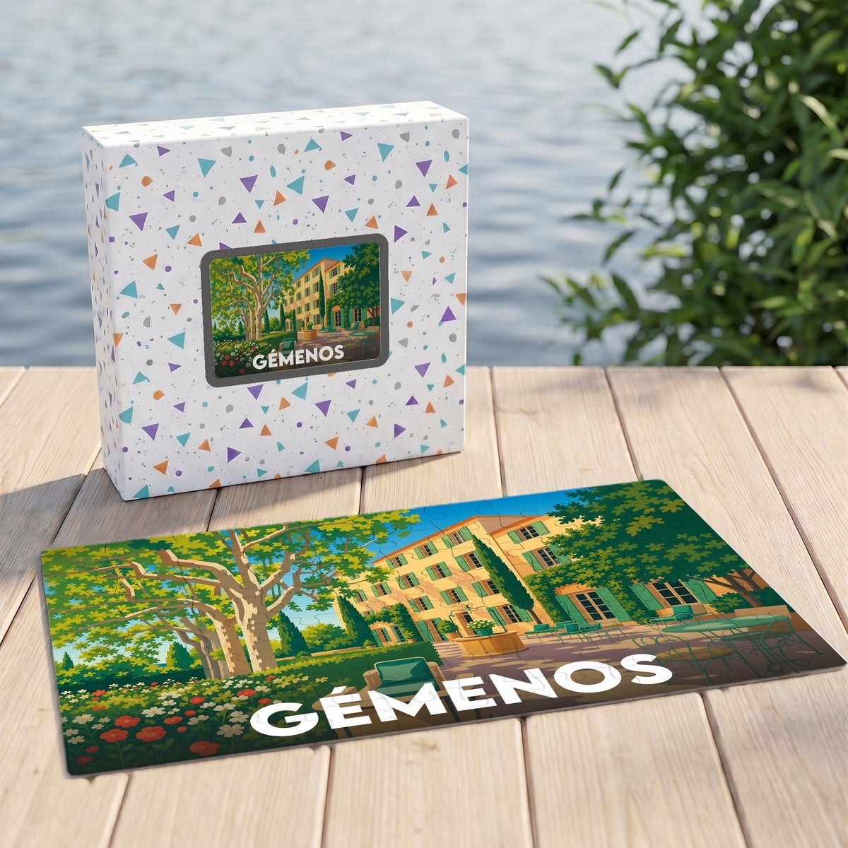 Puzzle souvenir de la ville de Gémenos illustrant une bastide provençale et son jardin arboré.