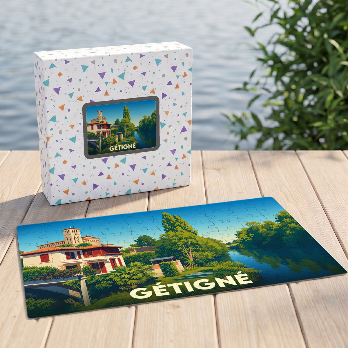 Puzzle souvenir de la ville de Gétigné avec une illustration stylisée d'un paysage de bord de l'eau.