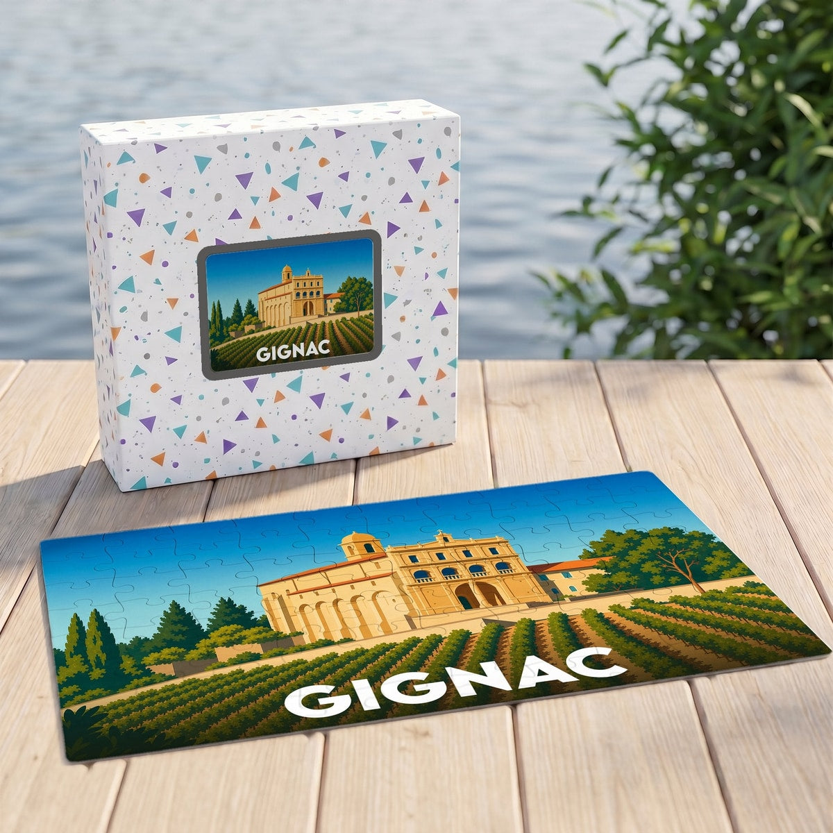 Puzzle souvenir de la ville de Gignac avec une illustration stylisée d'un bâtiment historique et de vignes.