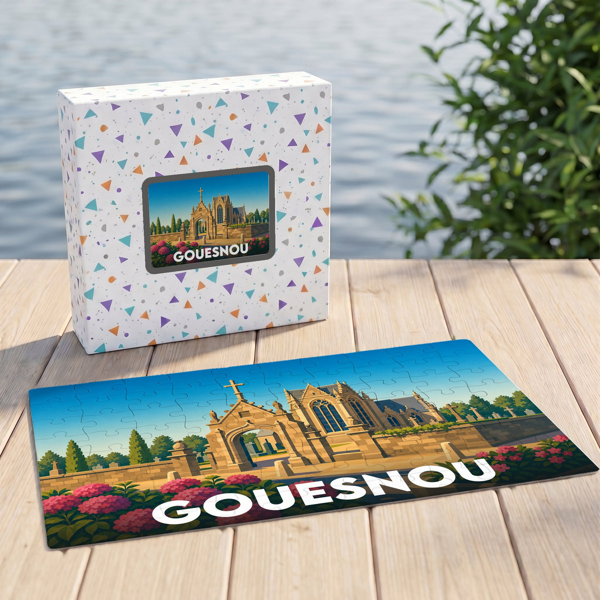 Puzzle souvenir de la ville de Gouesnou présentant une illustration stylisée d'un monument historique sur sa boîte et son plateau.