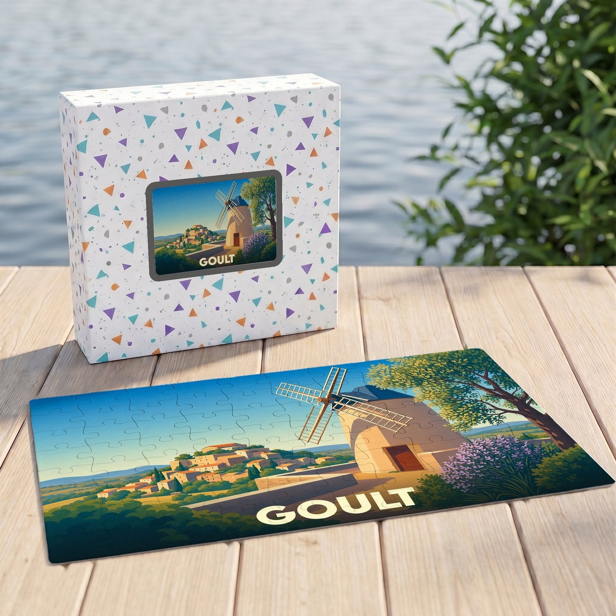 Puzzle souvenir de la ville de Goult avec une illustration stylisée d'un moulin de Provence.