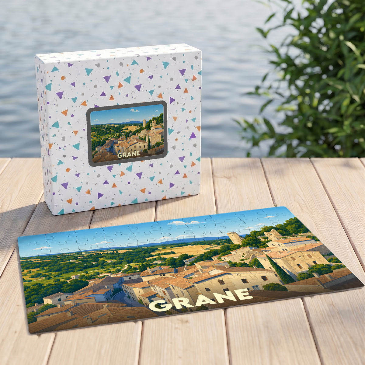 Puzzle souvenir de la ville de Grane avec une illustration panoramique de ses toits et de ses paysages.