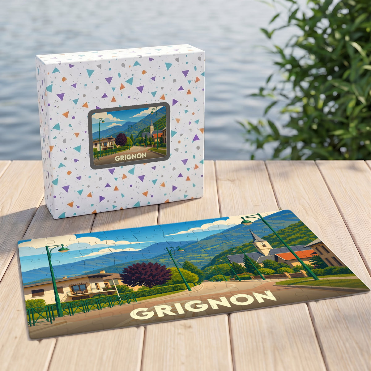 Puzzle souvenir de la ville de Grignon avec une illustration stylisée d'un paysage montagneux.