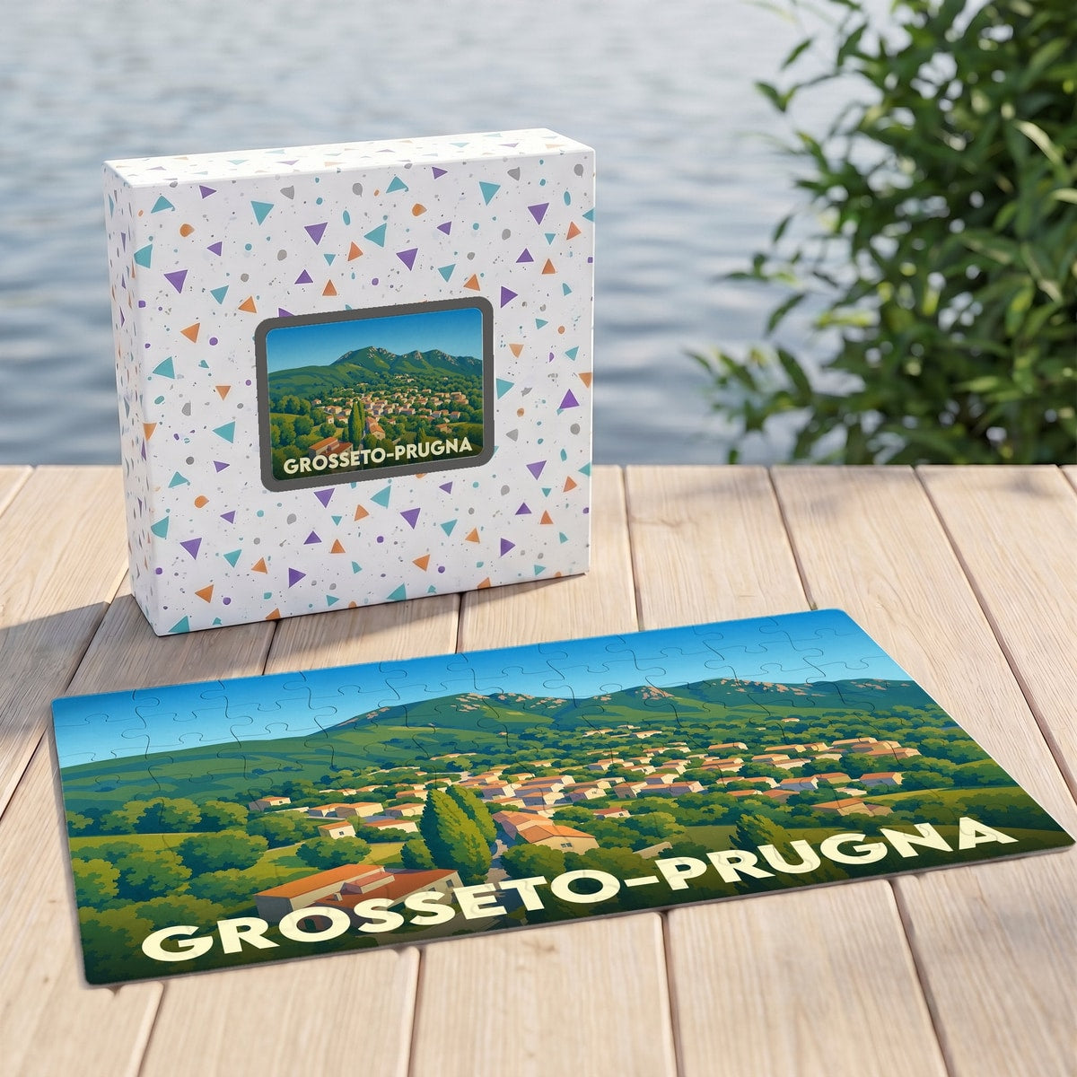 Puzzle souvenir de la ville de Grosseto-Prugna avec une illustration stylisée de son paysage vallonné.
