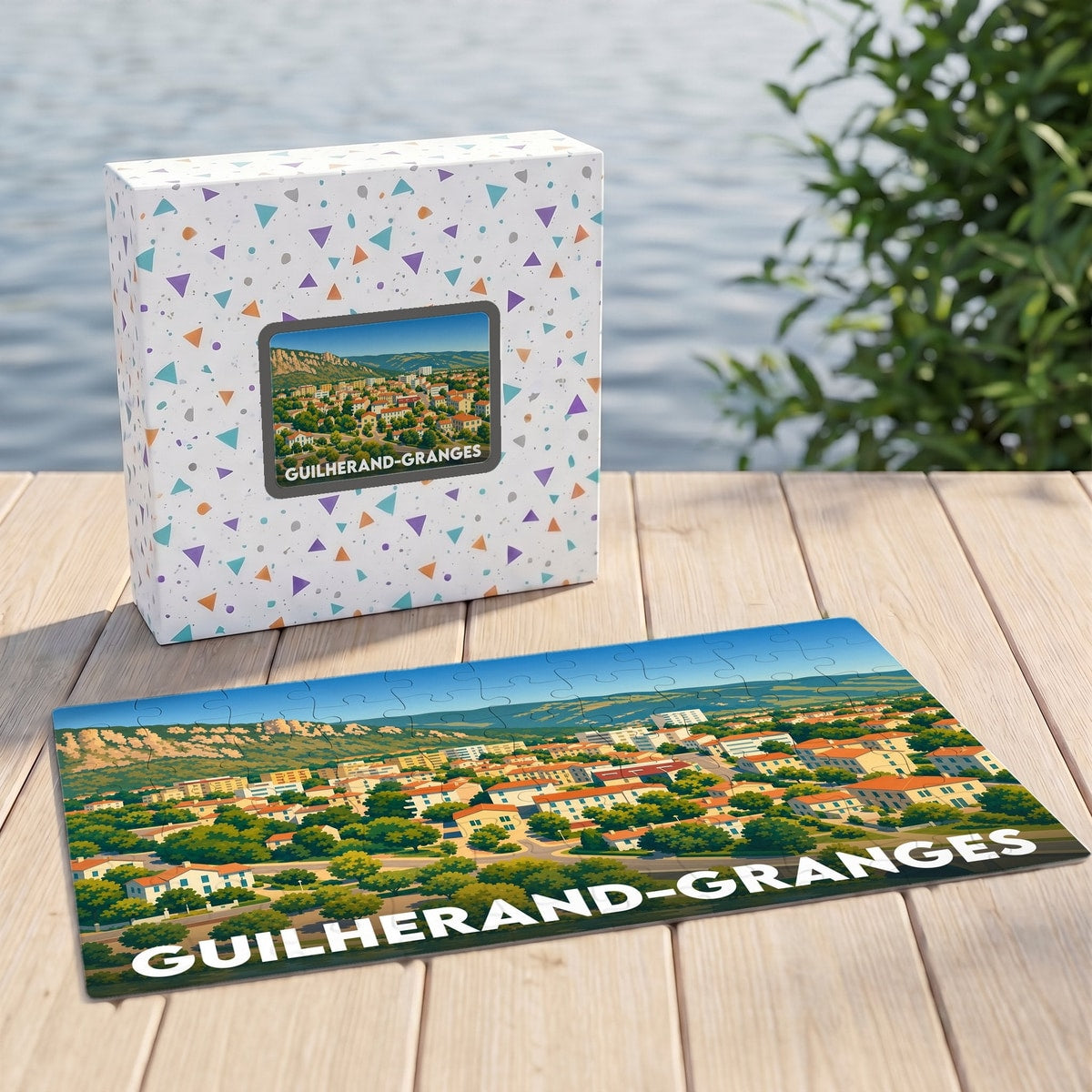 Puzzle souvenir de la ville de Guilherand-Granges avec une illustration panoramique stylisée.