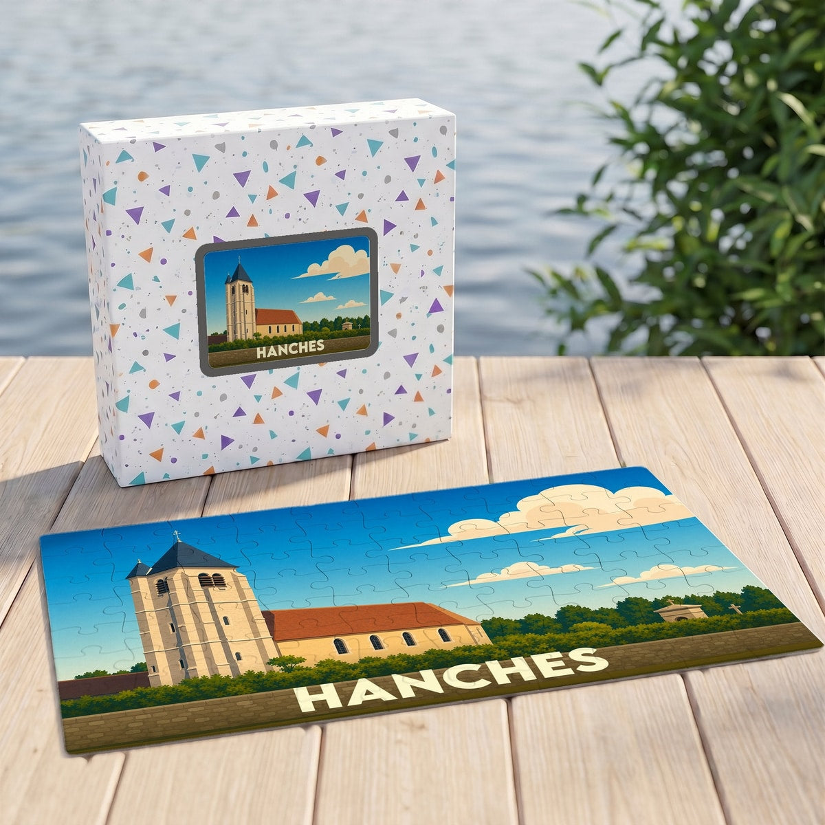 Puzzle souvenir de la ville de Hanches avec une illustration stylisée de son église.