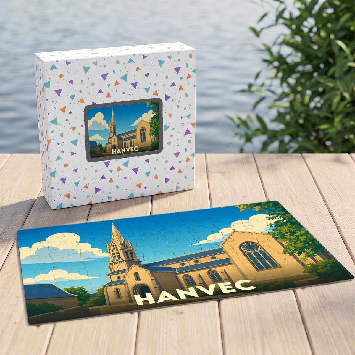 Puzzle souvenir de la ville de Hanvec représentant son église dans un style illustré et coloré.