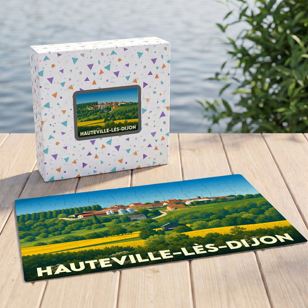 Puzzle souvenir de la ville de Hauteville-lès-Dijon avec son coffret et une illustration de paysage champêtre.
