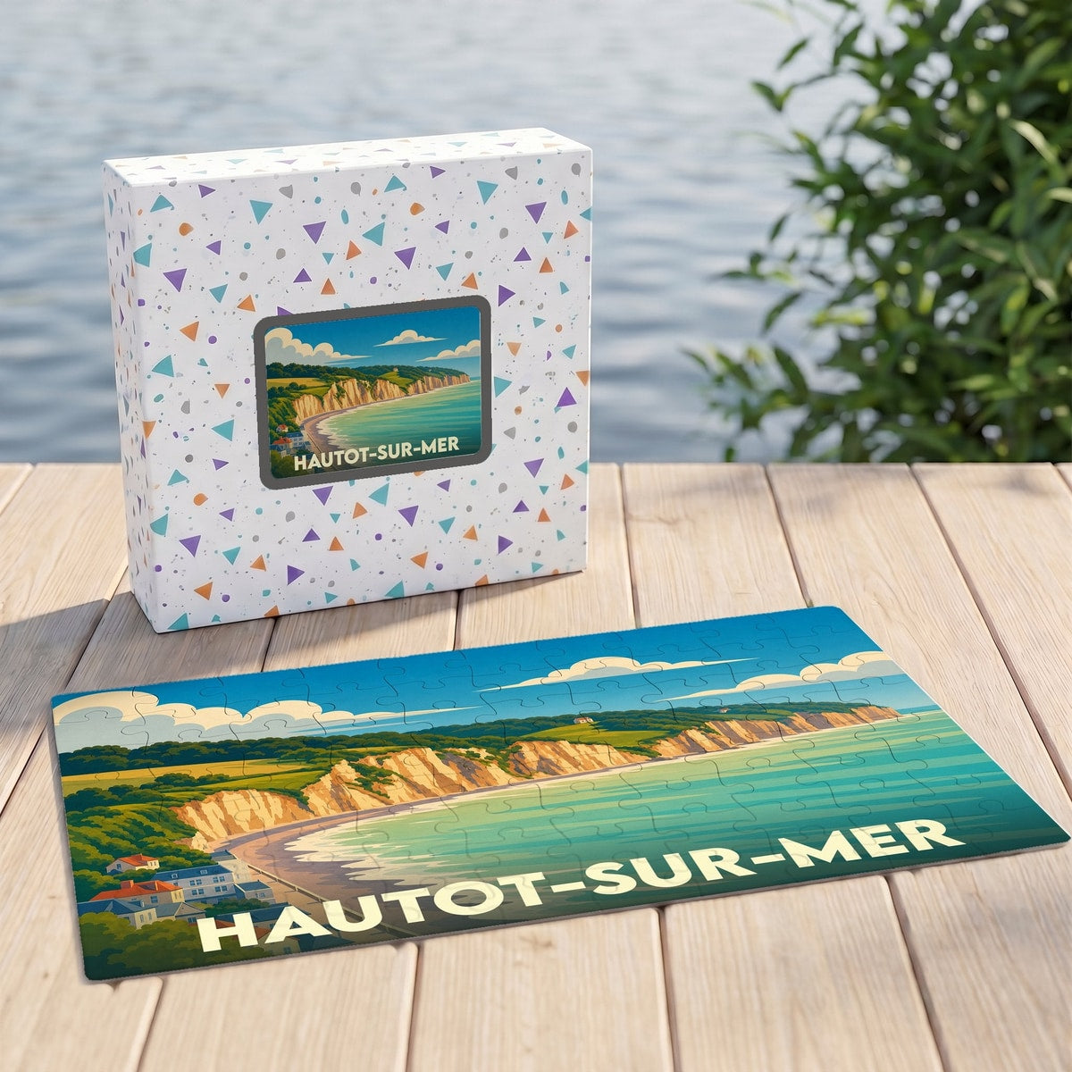 Puzzle souvenir de la ville de Hautot-sur-Mer avec une illustration stylisée de son littoral.