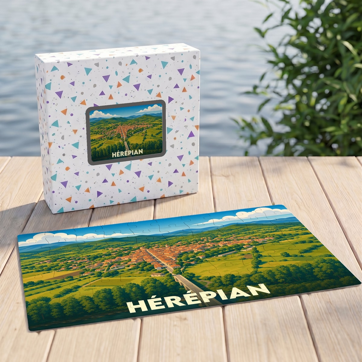 Puzzle souvenir de la ville de Hérépian avec une illustration paysagère stylisée.