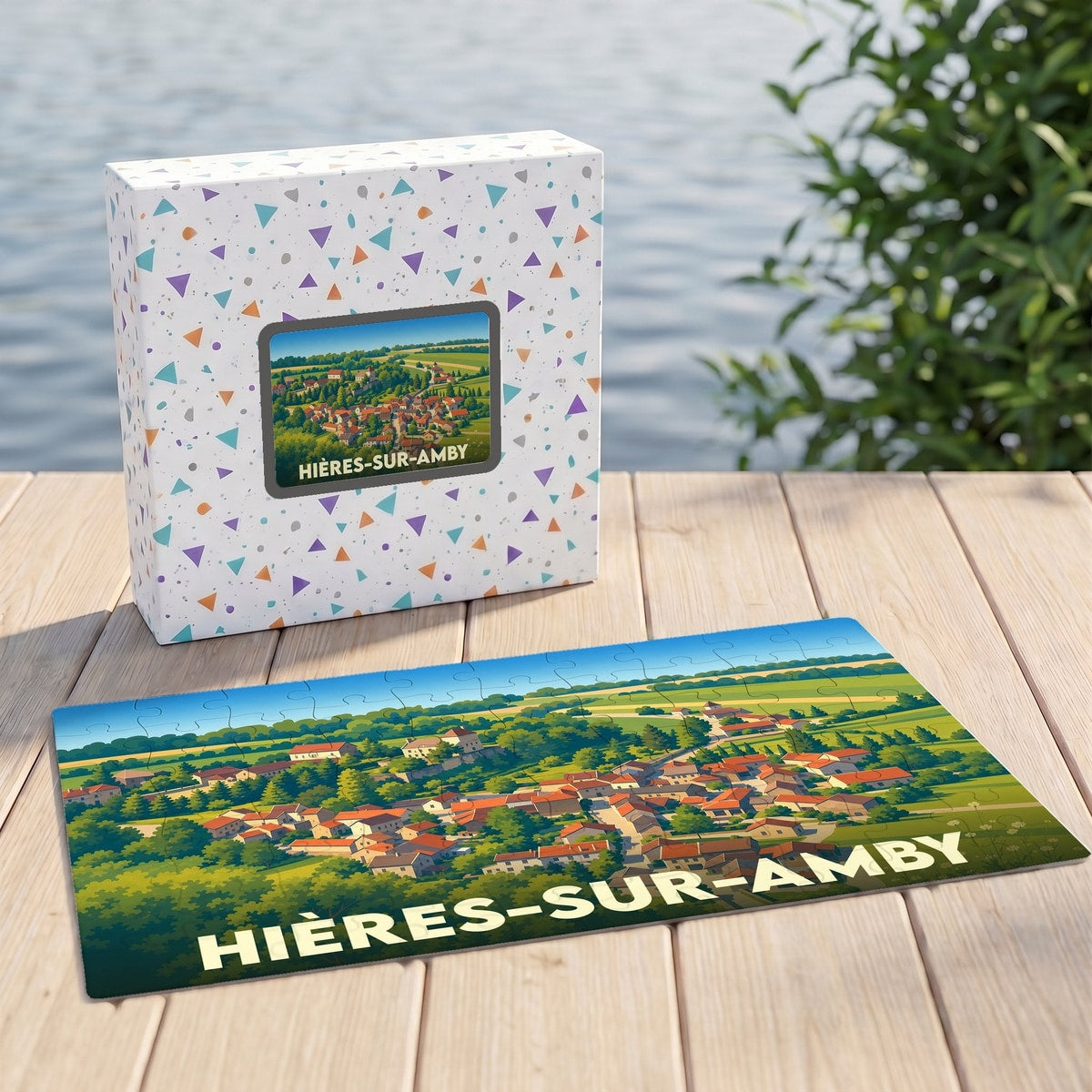 Puzzle souvenir de la ville de Hières-sur-Amby avec son illustration paysagère stylisée.