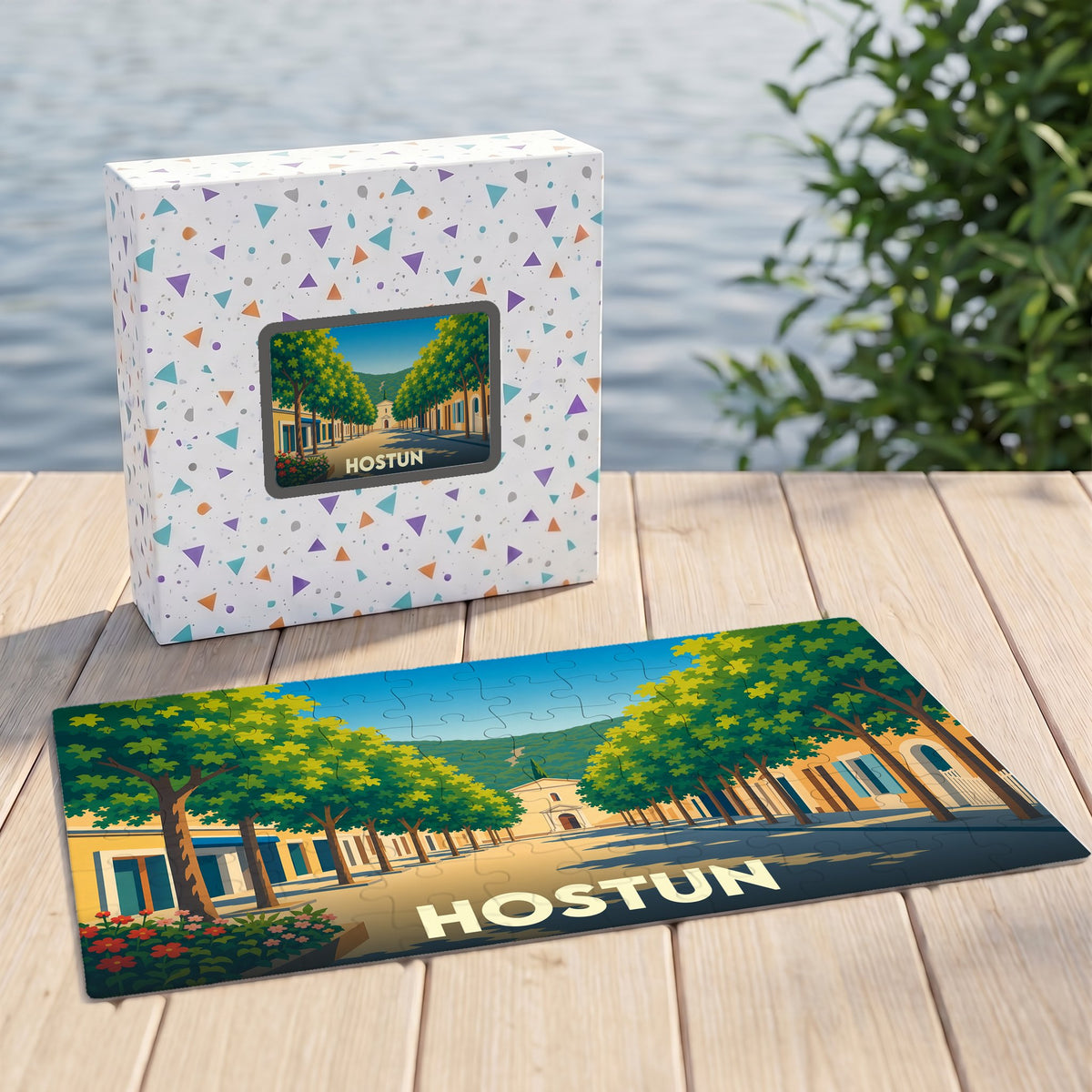 Puzzle souvenir de la ville de Hostun avec une illustration stylisée.