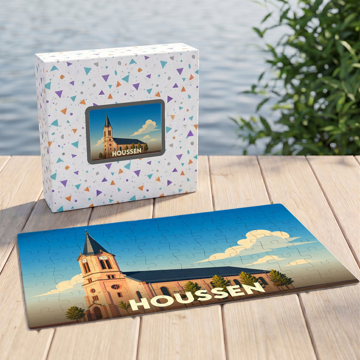 Puzzle souvenir de la ville de Houssen avec une illustration stylisée de son église.
