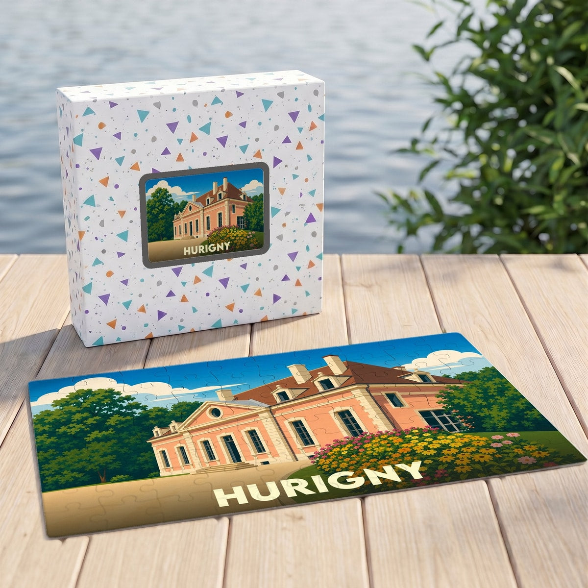 Puzzle souvenir de la ville de Hurigny avec une illustration stylisée d'un manoir.