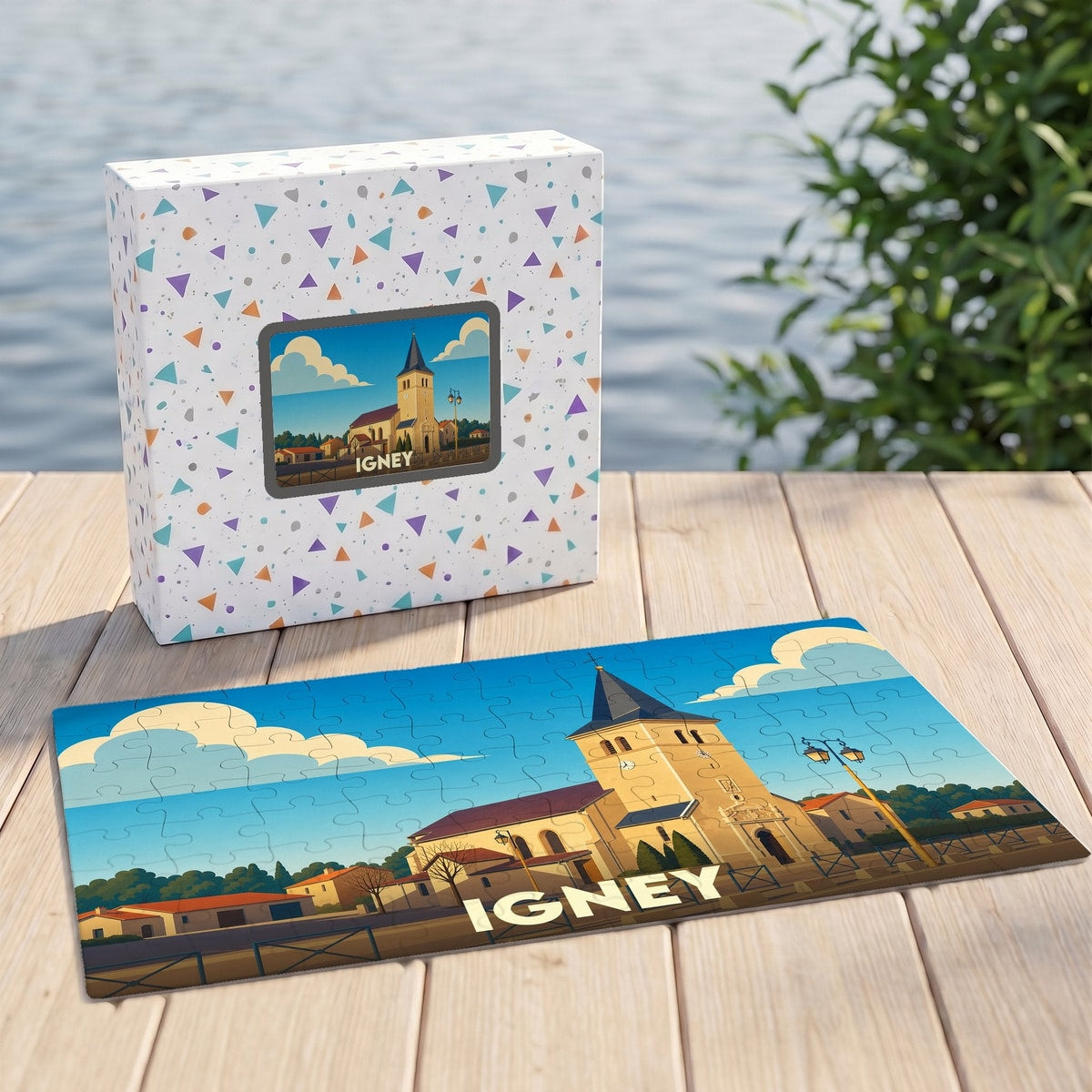 Puzzle souvenir de la ville de Igney avec une illustration stylisée de son église.