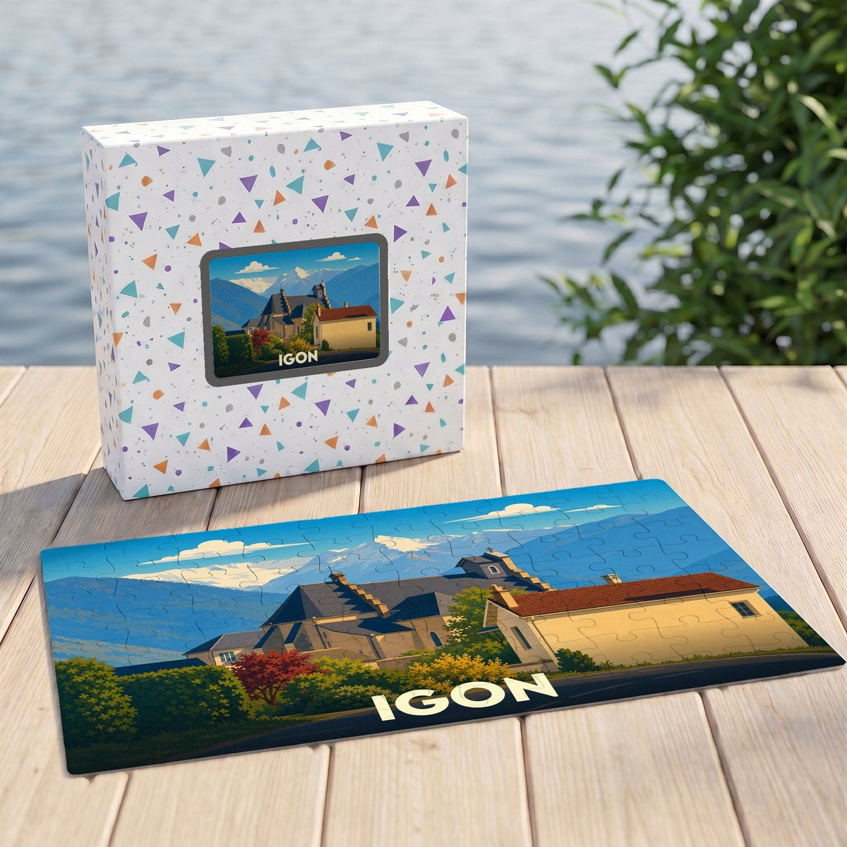 Puzzle souvenir de la ville d'Igon avec une illustration stylisée de son église et des montagnes.