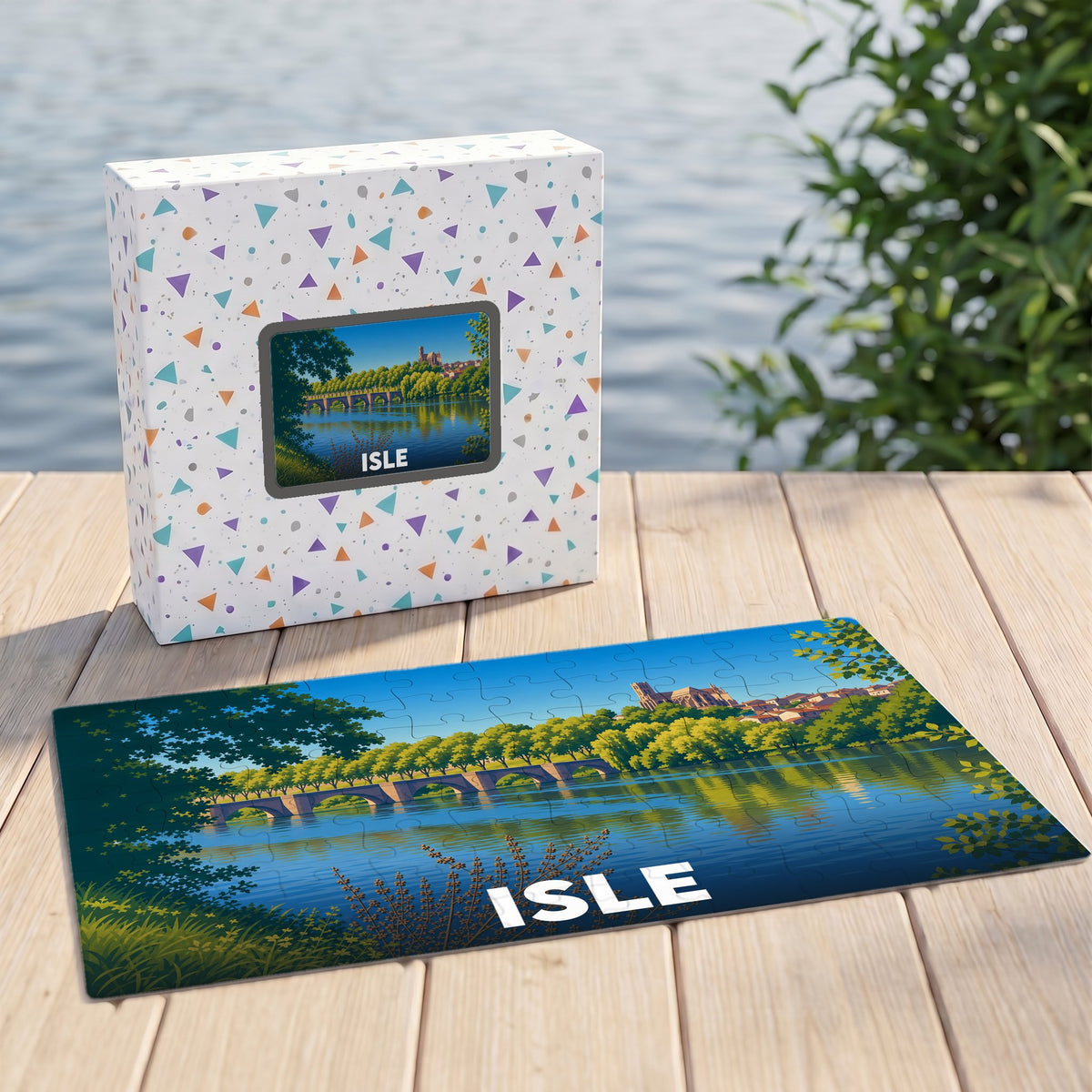 Puzzle souvenir de la ville de Isle avec une illustration stylisée représentant un pont et la rivière.
