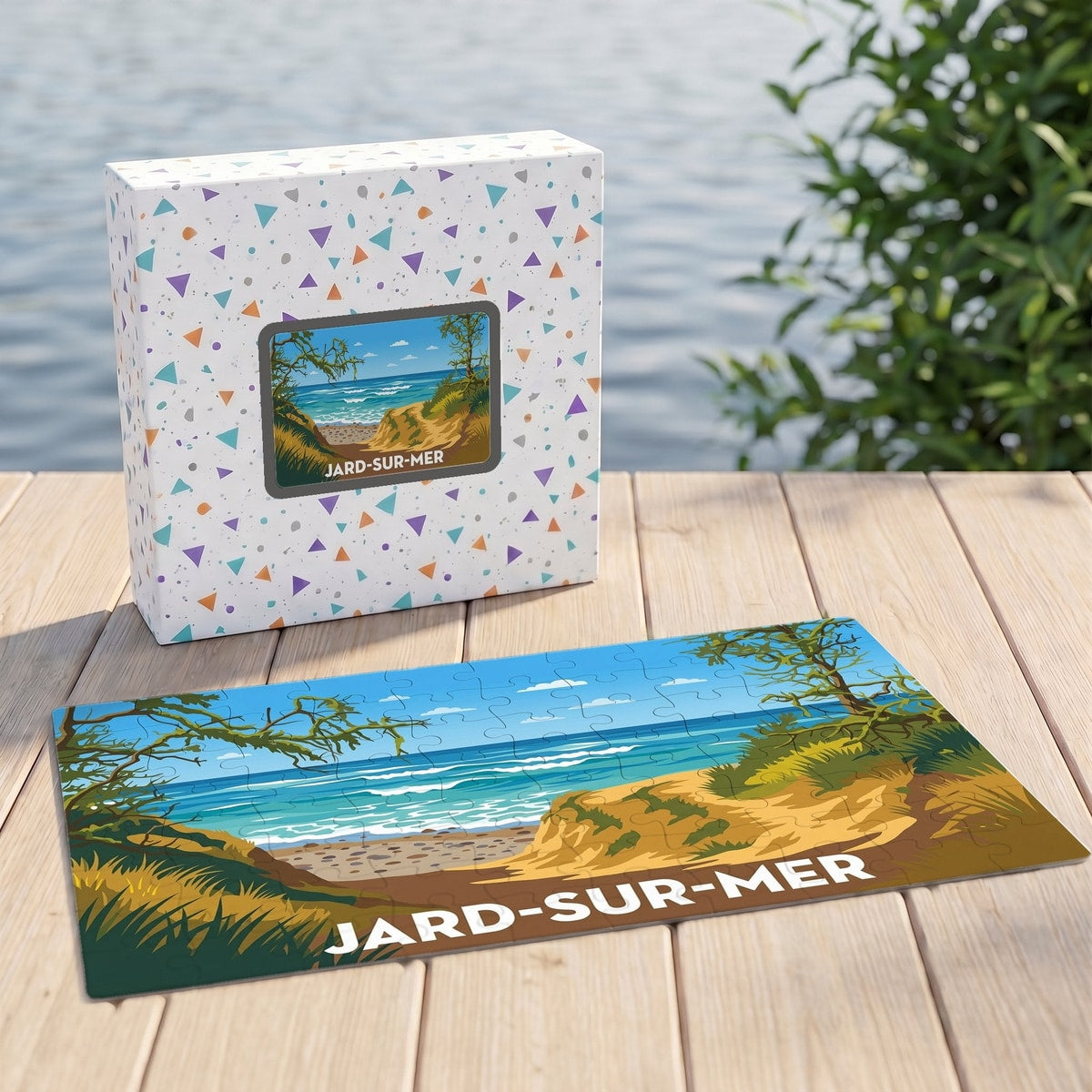 Puzzle souvenir de la ville de Jard-sur-Mer illustrant un paysage de dunes et de mer.