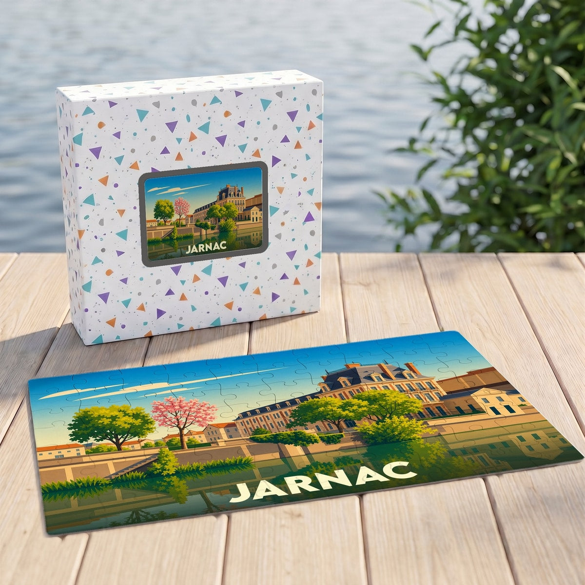 Puzzle souvenir de la ville de Jarnac avec une illustration colorée des quais et du patrimoine local.