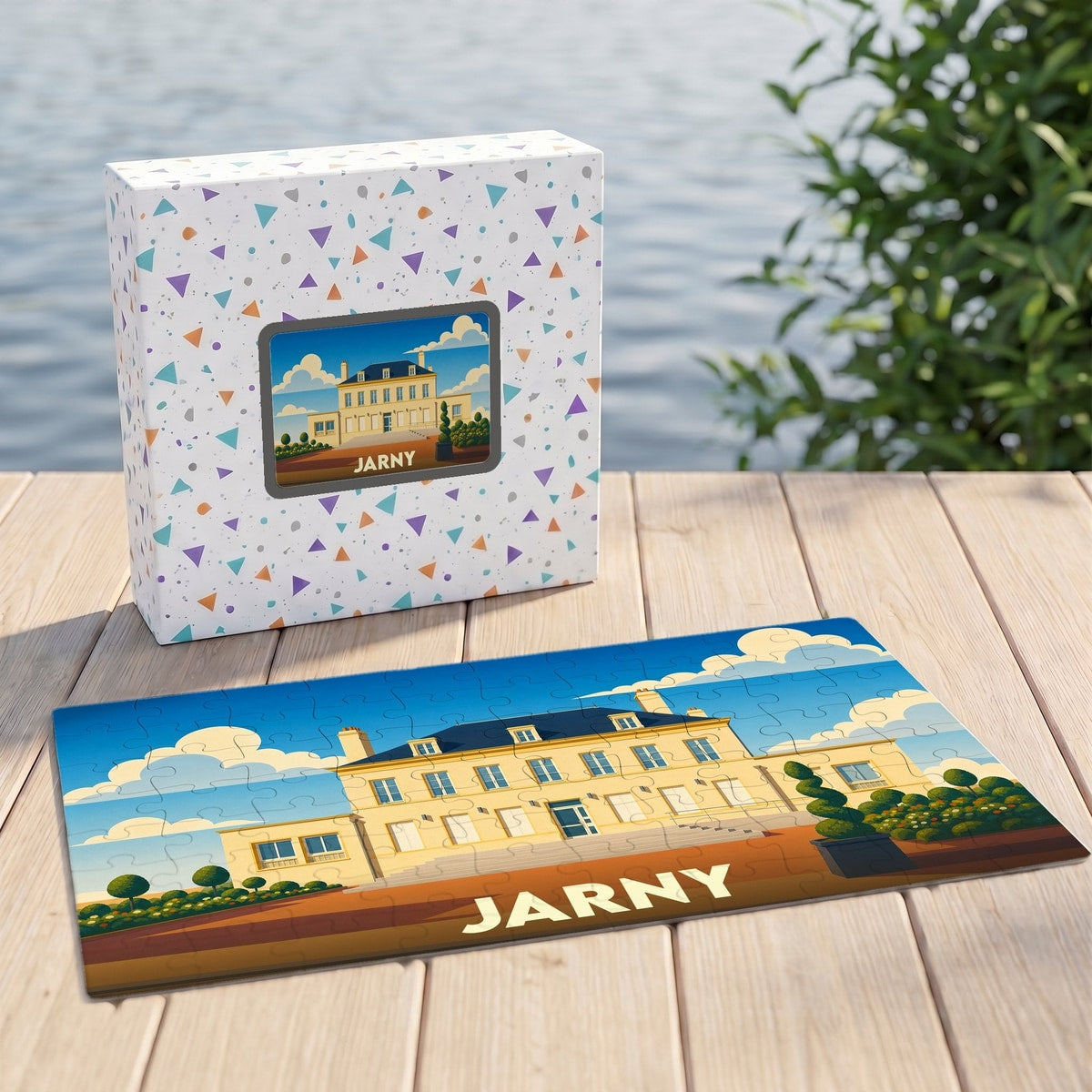 Puzzle souvenir de la ville de Jarny illustré d'un manoir stylisé sous un ciel bleu.